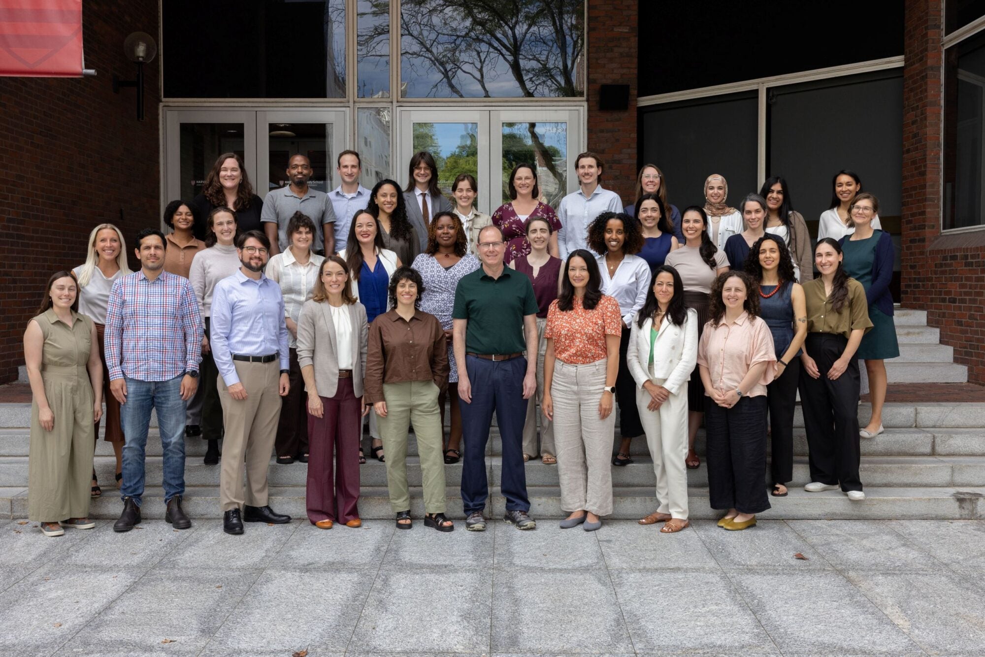 GPL Staff standing outside of the HKS building in Cambridge, Mass.